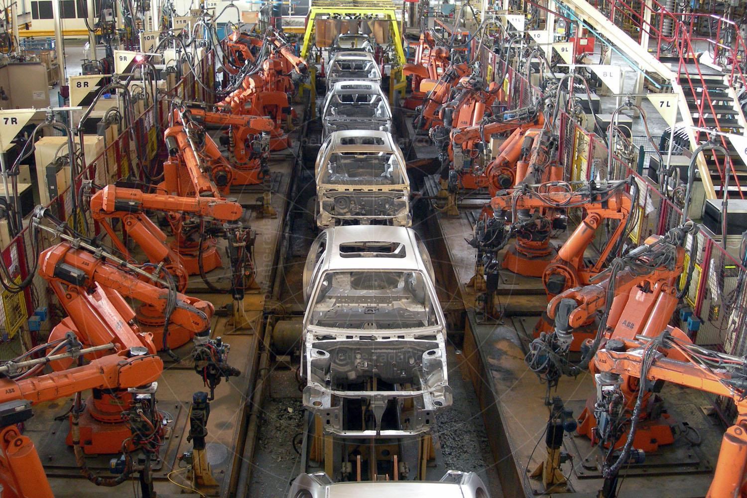 Across the road in New West Works, the robots sit motionless and the line of bodyshells is at a standstill Pic: Gillian Bardsley | Across the road in New West Works, the robots sit motionless and the line of bodyshells is at a standstill